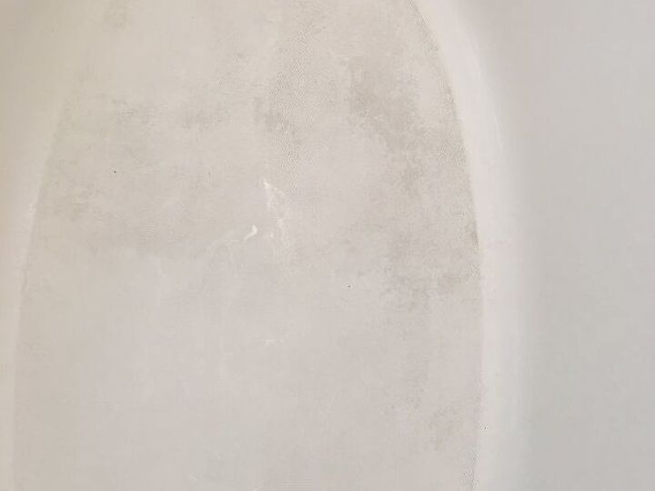 q how can i bring the bottom of my bathtub back to not having the dark s