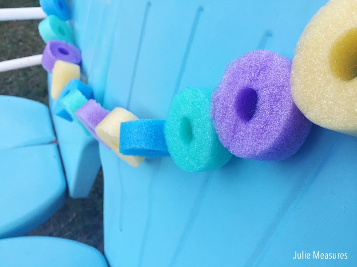14 creative ways to transform pool noodles into something new, Hang Them As An Outdoor Garland