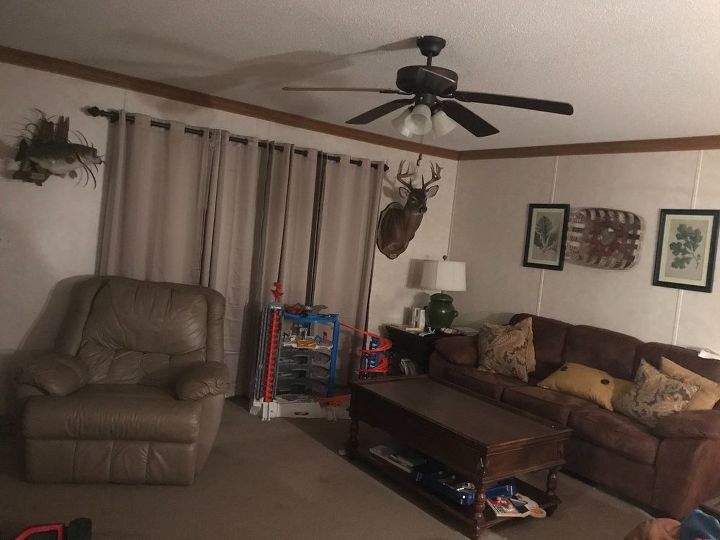 q how can i make this living room more vivid and welcoming