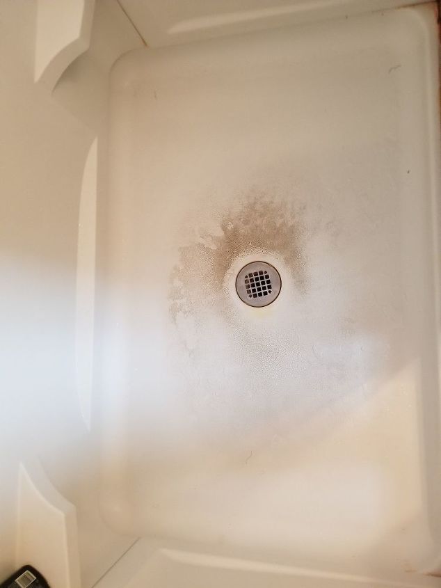 q can anyone tell me how to remove dirt from the floor of my shower