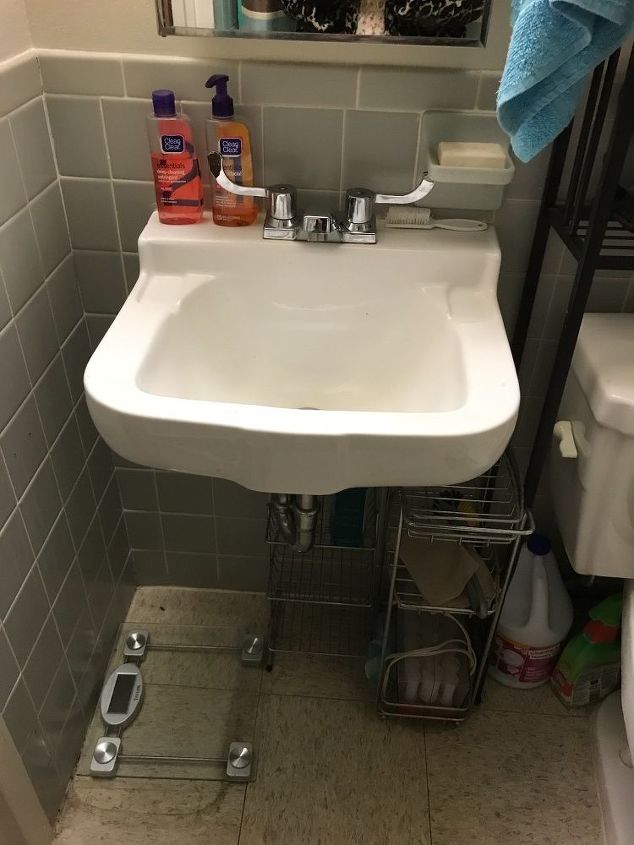 q use small dresser with wall hunggingsink in bathroom