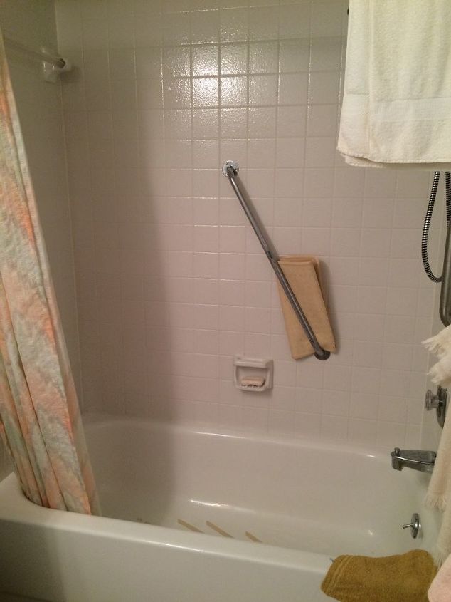 new life to old bathtub surround tile over tile yes you can