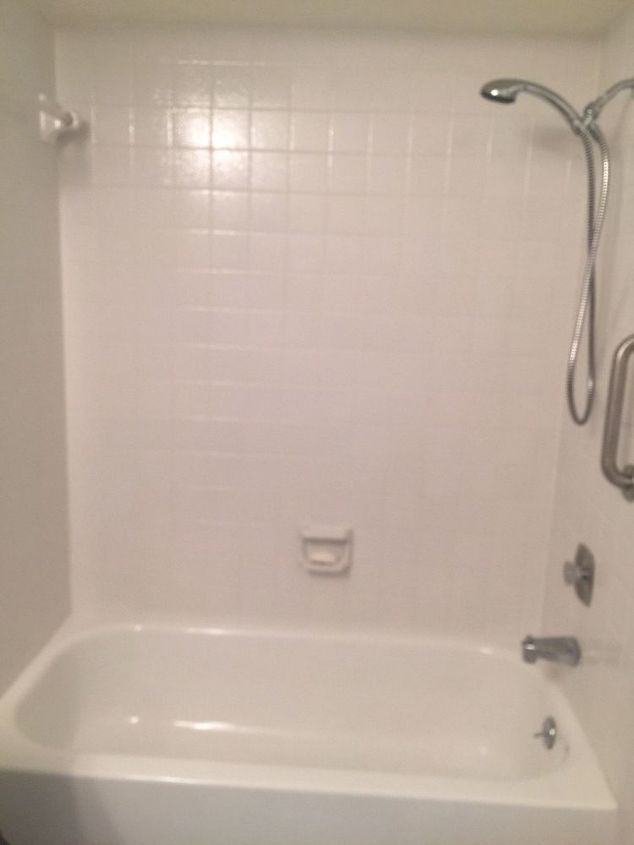 new life to old bathtub surround tile over tile yes you can