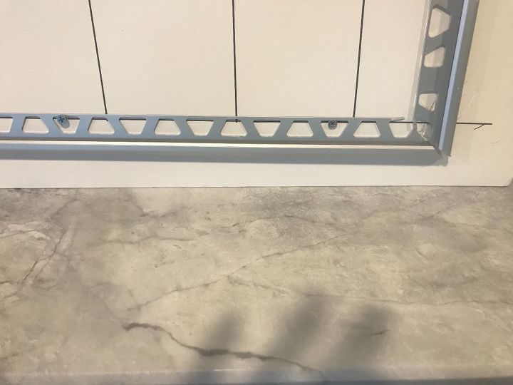 new life to old bathtub surround tile over tile yes you can