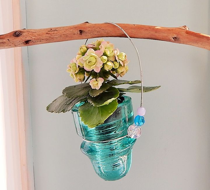 18 adorable container garden ideas to copy this spring, Insulator Turned Planter