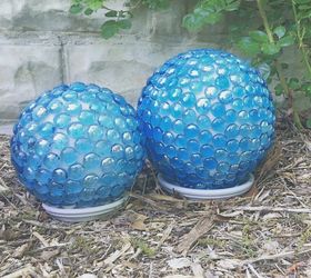 s 15 amazing ideas you can make with dollar store gems, Make pretty garden globes for your yard