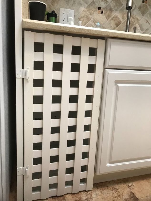 lattice door to hide kitchen trash cans