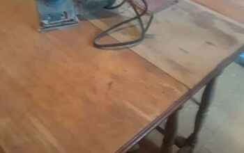 Vieja mesa de hoja caída a un escritorio