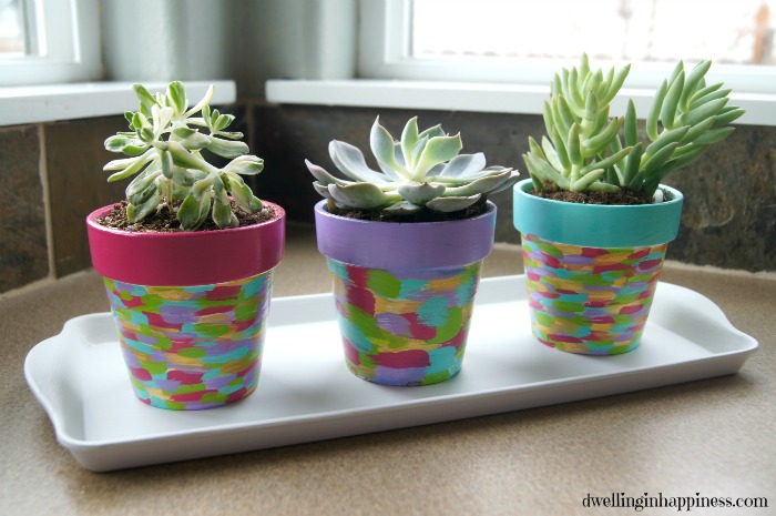 22 ideas to make your terra cotta pots look oh so pretty, Add some color with brush strokes
