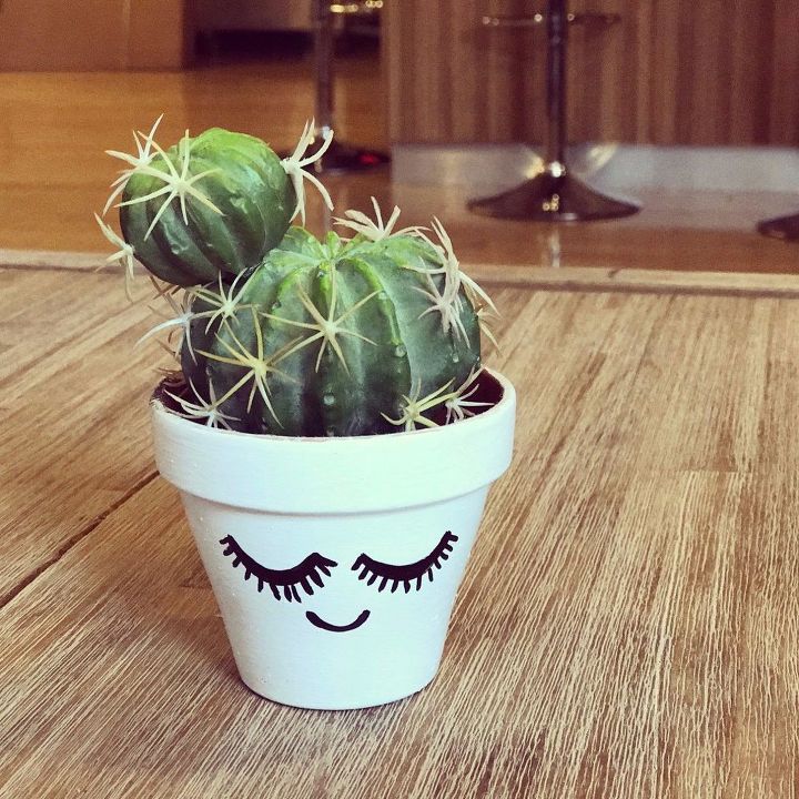 22 ideas to make your terra cotta pots look oh so pretty, Give them personality with eyelashes