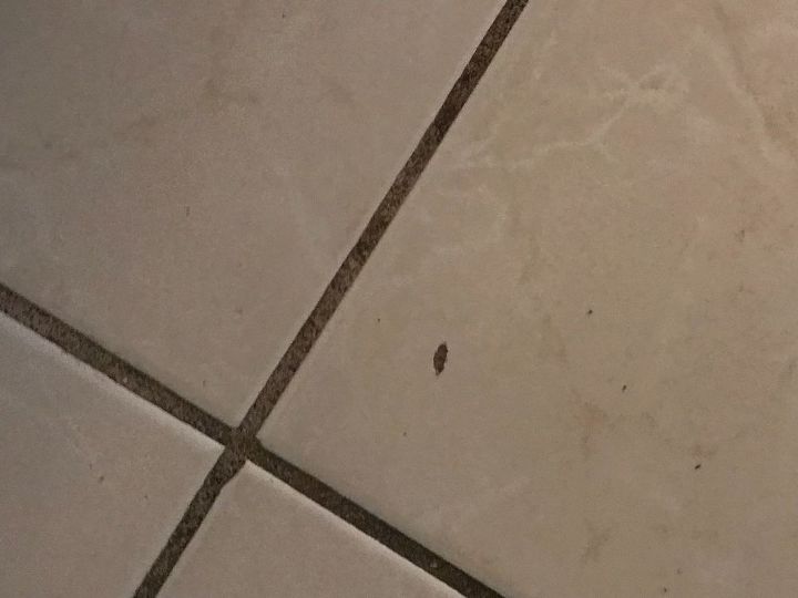 q how can i fix floor tile that has small chips