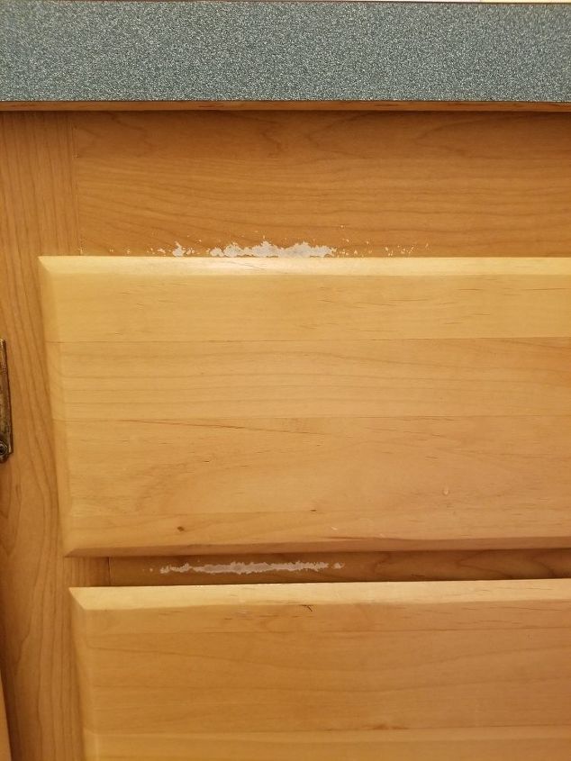 q how to fix cabinets that the finish has rubbed off the coververed the