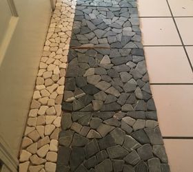 stone pebble tiles on top of old tiles