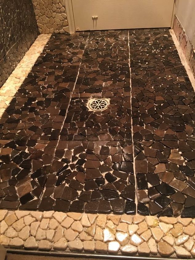 stone pebble tiles on top of old tiles