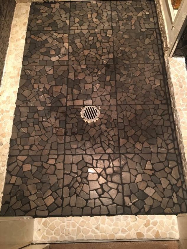 stone pebble tiles on top of old tiles