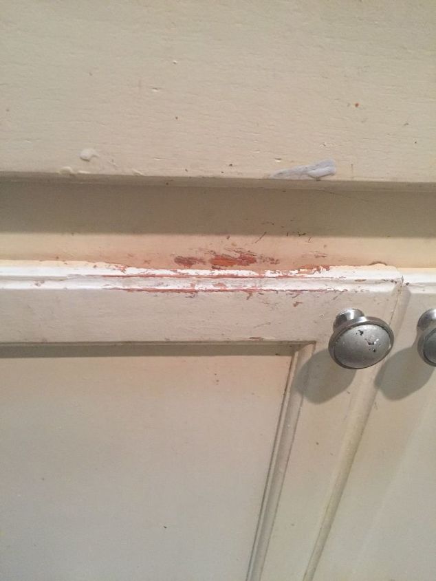 how to remedy paint wearing off my kitchen cabinets