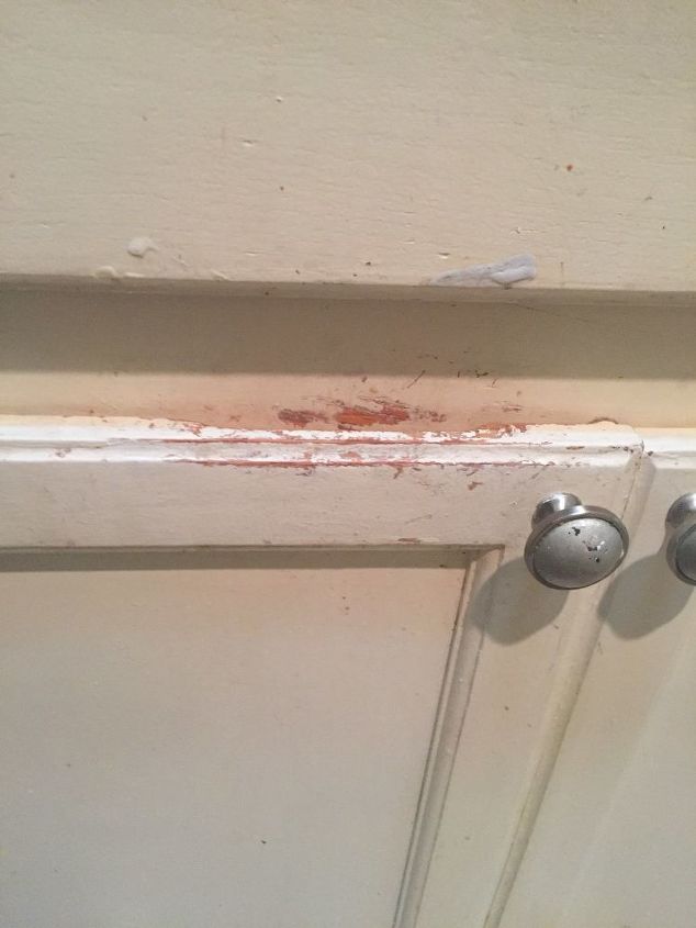 q how to remedy paint wearing off my kitchen cabinets