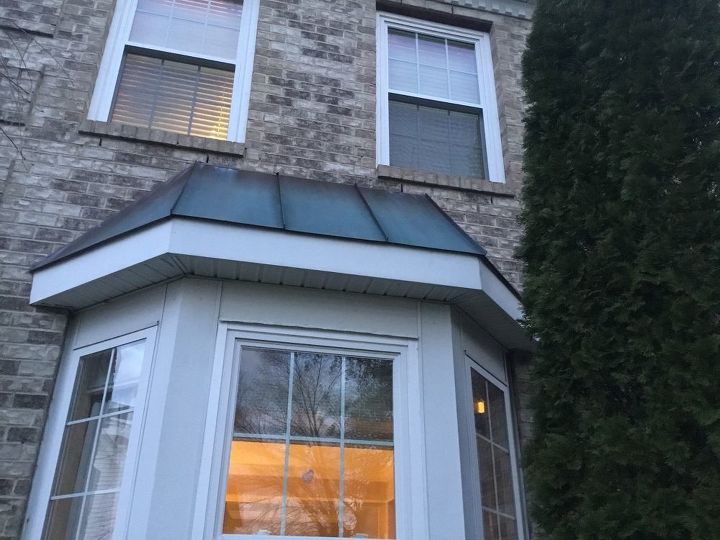 q water dripping from ceiling above bay windows