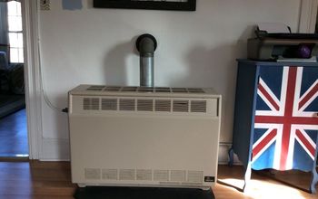 I need help disguising the gas space heater in my apartment livingroom