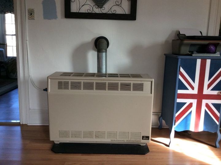 i need help disguising the gas space heater in my apartment livingroom