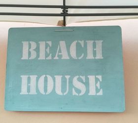 textured and weathered beach sign