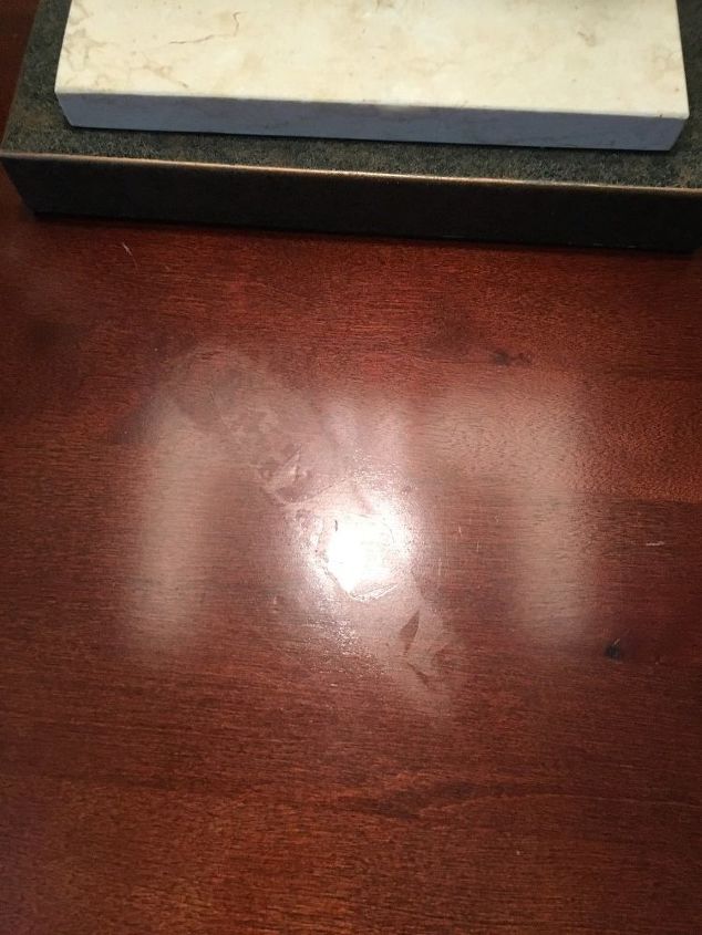 q water heat mark on wood end table