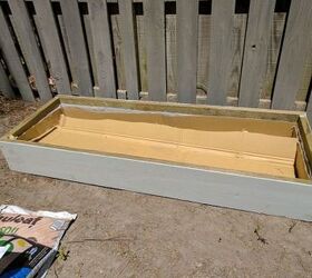 build two raised herb gardens for less than 50, Line the beds with cardboard