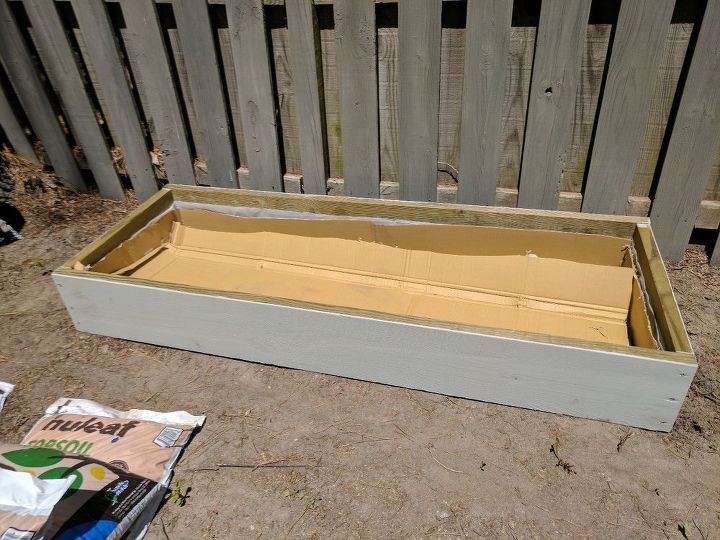 build two raised herb gardens for less than 50, Line the beds with cardboard