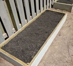 build two raised herb gardens for less than 50, Beds completely filled with soil