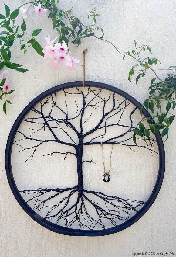 s 15 clever repurposing ideas that will add some creativity to your home, A beautiful bicycle wheel tree of life