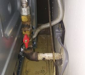 moving gas pipe behind oven