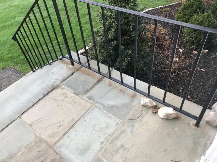 q how do i remove rust stains on my outside stone steps