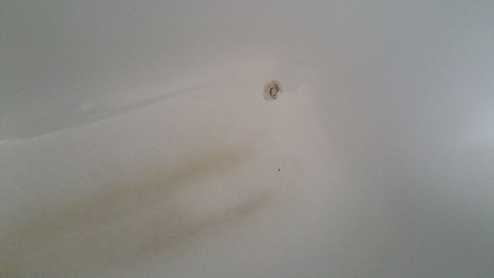 q about my rusty spots bath tub