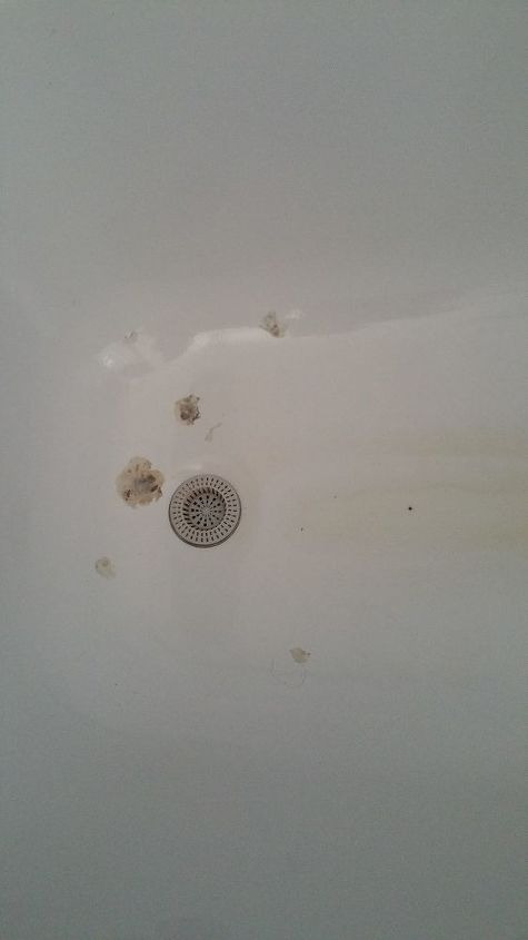 q about my rusty spots bath tub