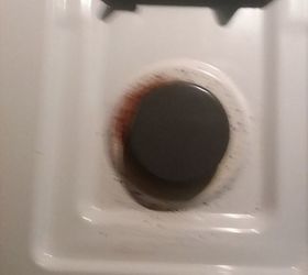 q any advice on removing the baked on stains on a range top
