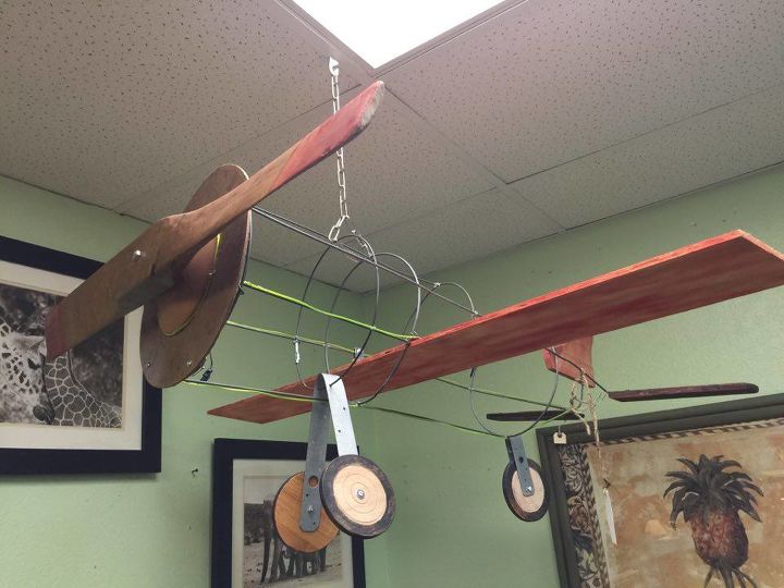 15 unconventional ways to use a tomato cage, Make it fly from your ceiling