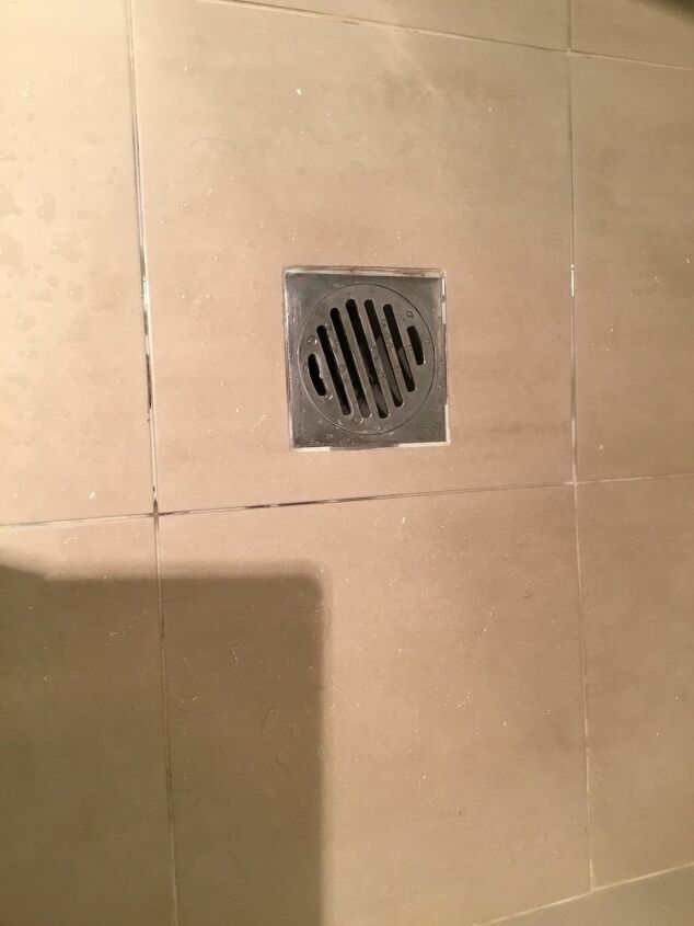 fresh grout dissolving in shower