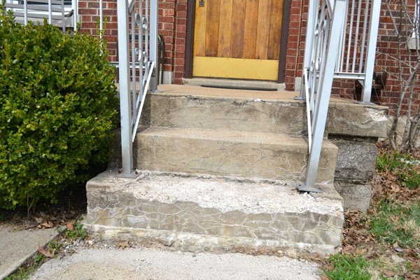 covering an ugly concrete porch