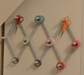 s craft organization ideas mom will love, Repurposed Accordion Peg Hanger