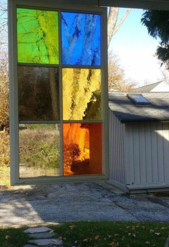 s how to get backyard privacy without a fence, Hang up some stained glass panels