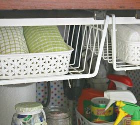 s the 15 smartest storage hacks for under your sink, Hang baskets for vertical storage