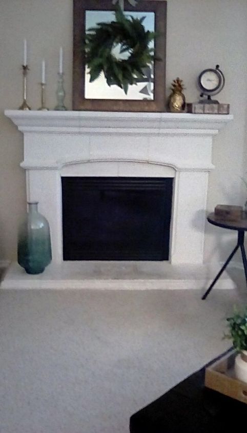 q i need ideas on how to update this builder grade fireplace