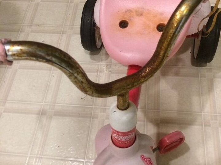 q how do i remove rust from handlebars of a childs bike and furbish it
