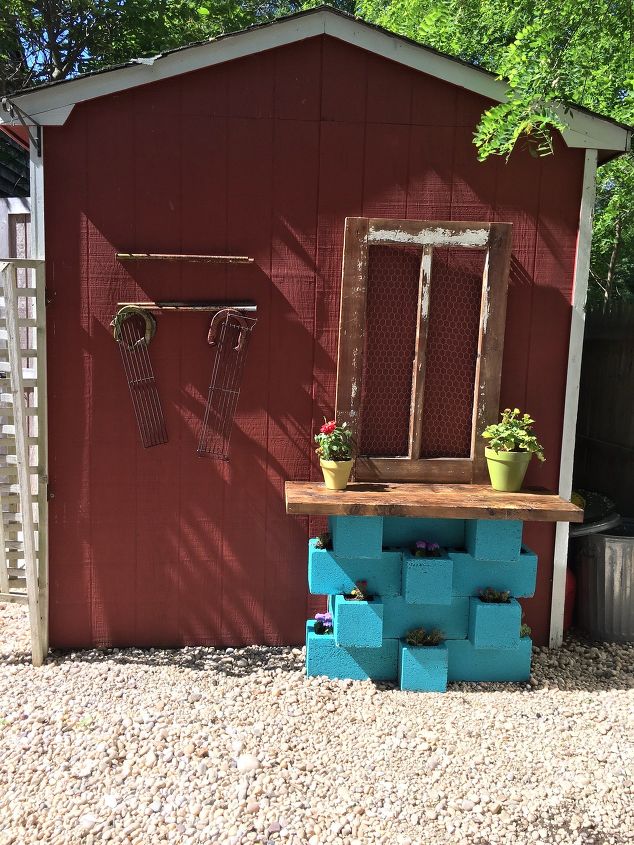 s 10 genius ways to use cinder blocks in your garden, Turn them into an outdoor gardening station