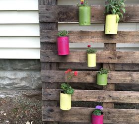 15 cute ways to decorate tin cans into planters, Painted and hung on a pallet