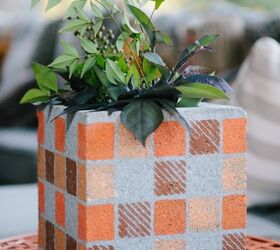 15 genius ways to use cinder blocks in your garden, Decorate them as pretty flower pots