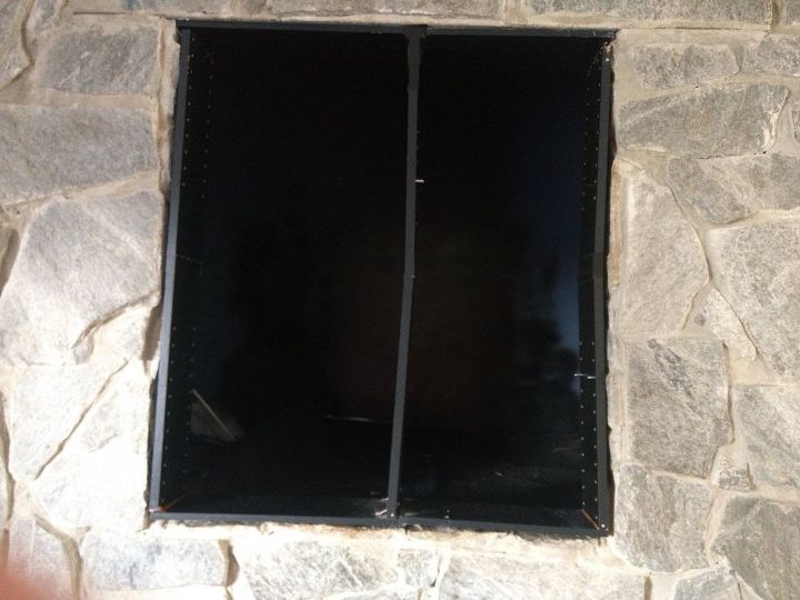 q cover empty tv space above fireplace