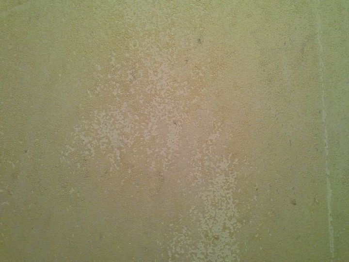 q how do you get commercial grade glue off a wall