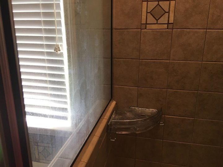 q how to remove soap scum on glass shower that has been there for years