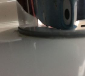 how do you get rid of hard water stains around faucets